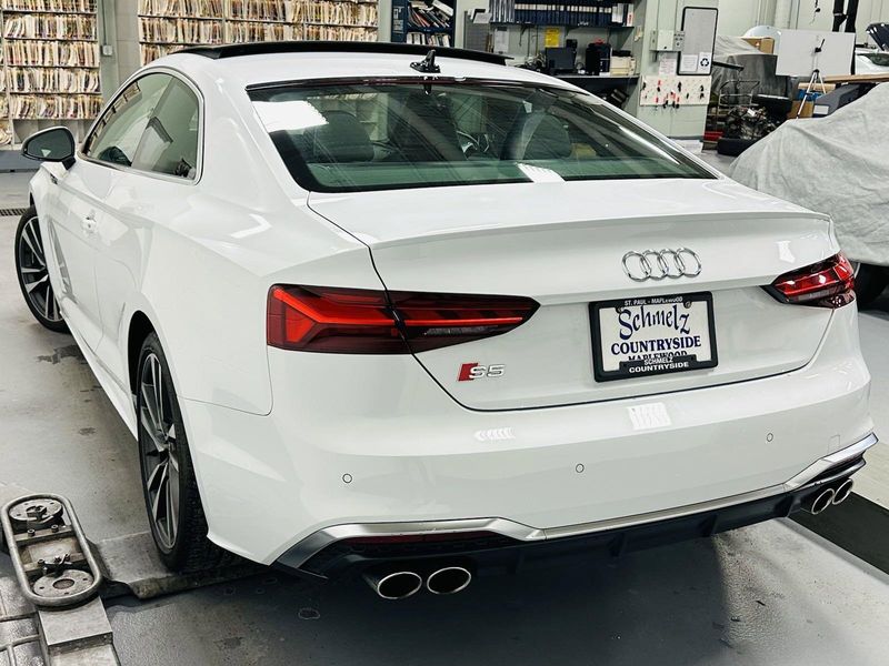 2022 Audi S5 Coupe Premium Plus AWD w/Nav in a Glacier White Metallic exterior color and Black Heated Leatherinterior. Schmelz Countryside Alfa Romeo (651) 867-3222 schmelzalfaromeo.com 