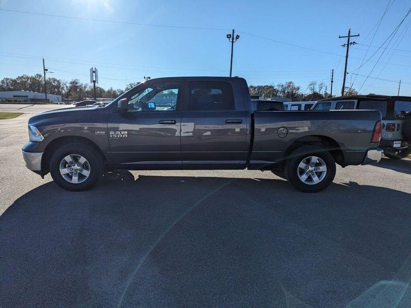 2021 RAM 1500 Classic SLT in a Granite Crystal Metallic Clear Coat exterior color and Diesel Gray/Blackinterior. Johnson Dodge 601-693-6343 pixelmotiondemo.com 