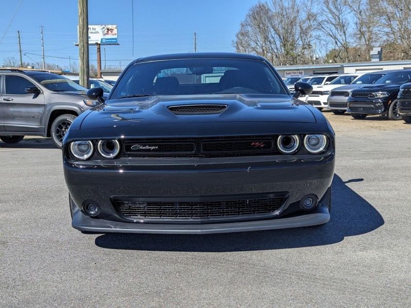 2023 Dodge Challenger R/T Scat Pack in a Pitch-Black exterior color and Blackinterior. Johnson Dodge 601-693-6343 pixelmotiondemo.com 
