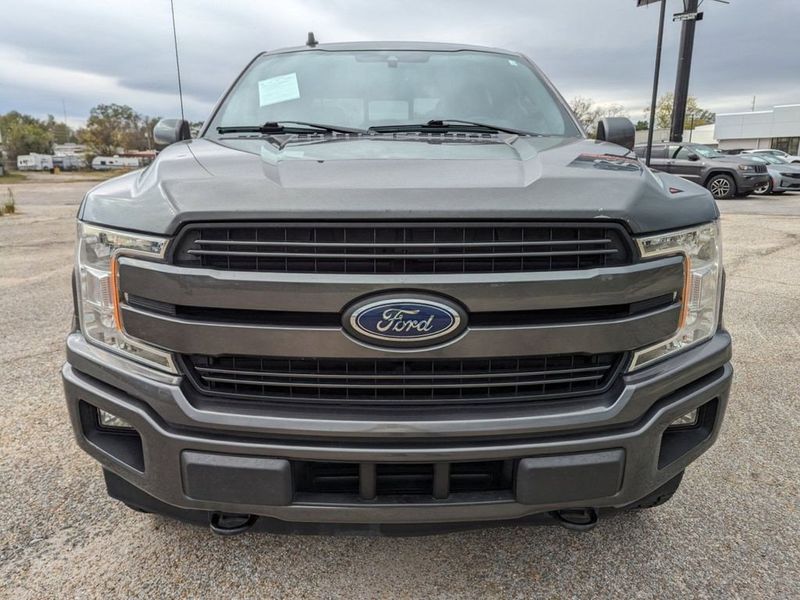 2020 Ford F-150 Lariat in a Magnetic Metallic exterior color and Blackinterior. Johnson Dodge 601-693-6343 pixelmotiondemo.com 