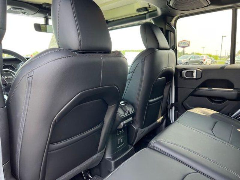 2023 Jeep Wrangler Sahara 4xe in a Silver Zynith Clear Coat exterior color and Blackinterior. Lakeshore CDJR Seaford 302-213-6058 lakeshorecdjr.com 