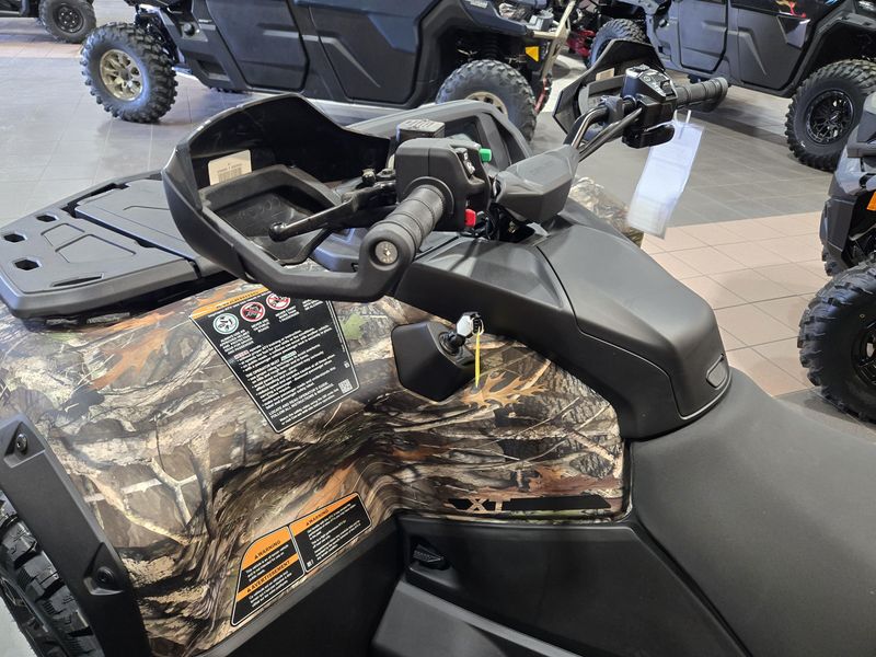 2025 CAN-AM OUTLANDER MAX XT 1000 WILDLAND CAMO  in a WILDLAND CAMO exterior color. Family PowerSports (877) 886-1997 familypowersports.com 