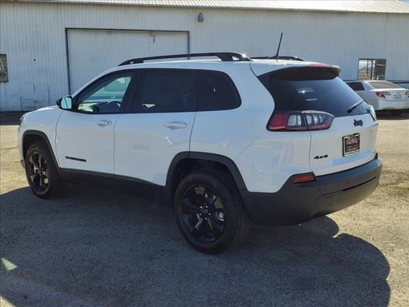 2023 Jeep Cherokee Altitude in a Bright White Clear Coat exterior color and Blackinterior. Perris Valley Auto Center 951-657-6100 perrisvalleyautocenter.com 