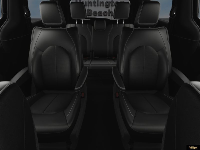 2023 Chrysler Pacifica Hybrid Touring L in a Bright White exterior color and Blackinterior. BEACH BLVD OF CARS beachblvdofcars.com 
