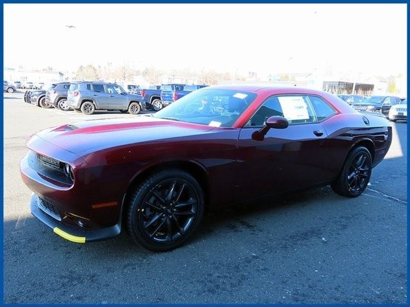 2023 Dodge Challenger GT in a Octane Red exterior color and Blackinterior. Papas Jeep Ram In New Britain, CT 860-356-0523 papasjeepram.com 