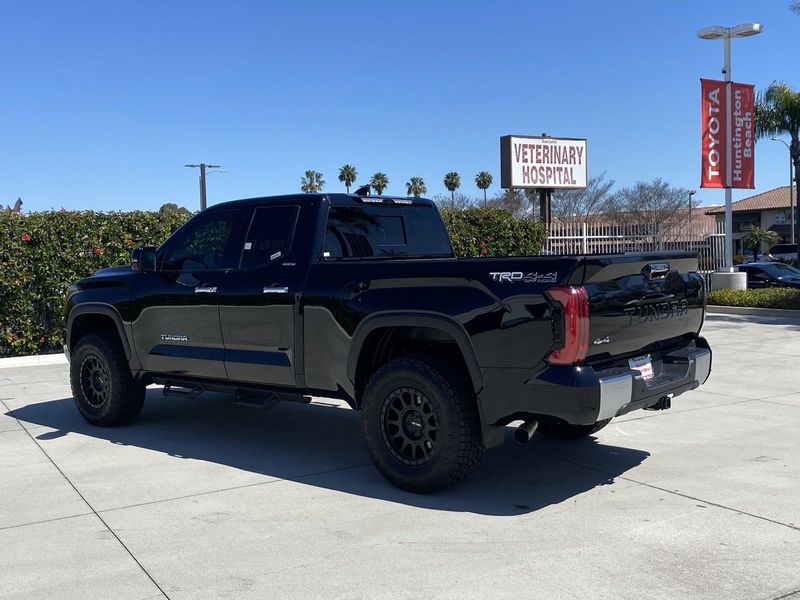 2023 Toyota Tundra Limited in a Midnight Black Metallic exterior color and BLK SOFTEXinterior. BEACH BLVD OF CARS beachblvdofcars.com 