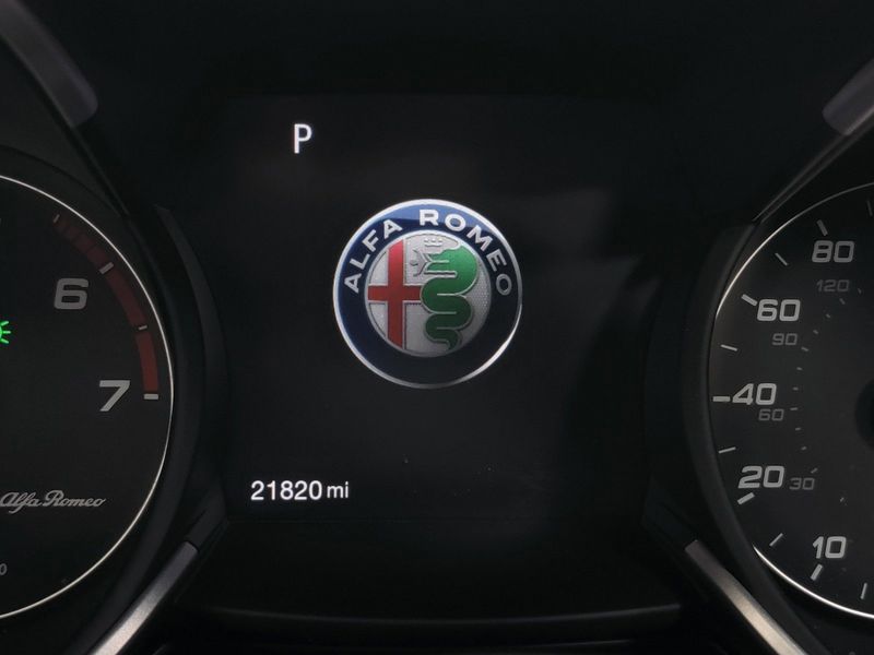 2021 Alfa Romeo Stelvio Sprint Nero Q4 AWD w/Sunroof/Snd in a Vulcano Black Metallic exterior color and Black Heated Leatherinterior. Schmelz Countryside Alfa Romeo (651) 867-3222 schmelzalfaromeo.com 