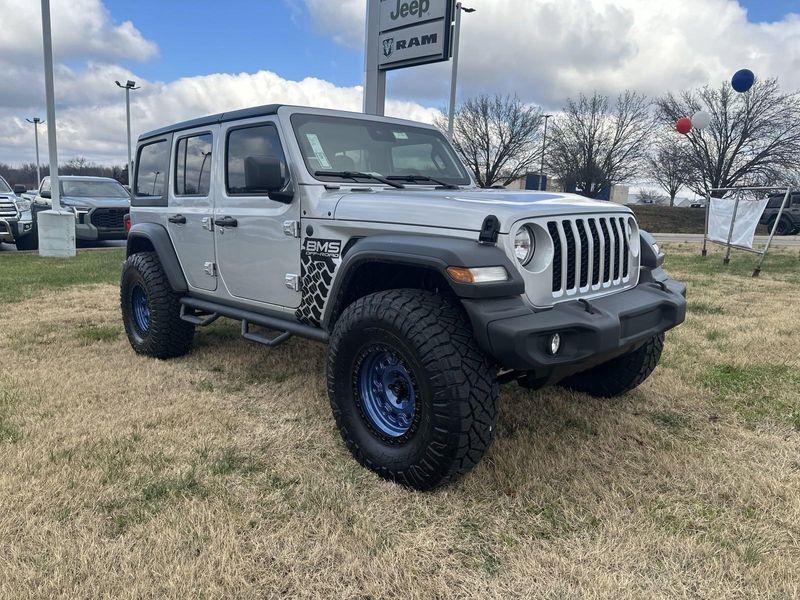 2024 Jeep Wrangler 4-door Sport S in a Silver Zynith Clear Coat exterior color and Blackinterior. Gupton Motors Inc 615-384-2886 guptonmotors.com 