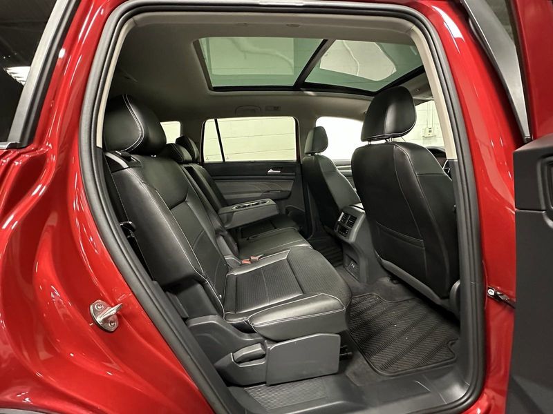 2022 Volkswagen Atlas SEL AWD w/Sunroof & Navi in a Aurora Red Metallic exterior color and Black Heated Seatsinterior. Schmelz Countryside Alfa Romeo and Fiat (651) 968-0556 schmelzfiat.com 