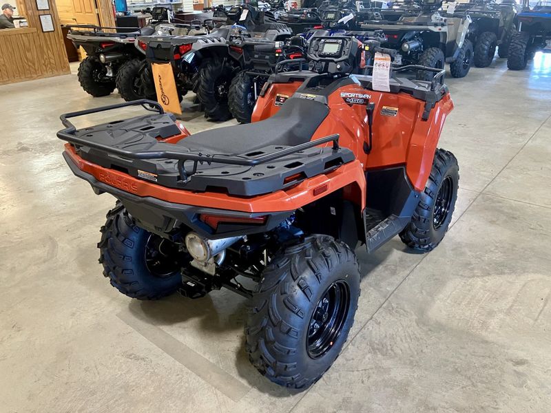 2024 Polaris Sportsman 450 H.O. EPS in a Orange exterior color. Genuine RV & Powersports (936) 569-2523 