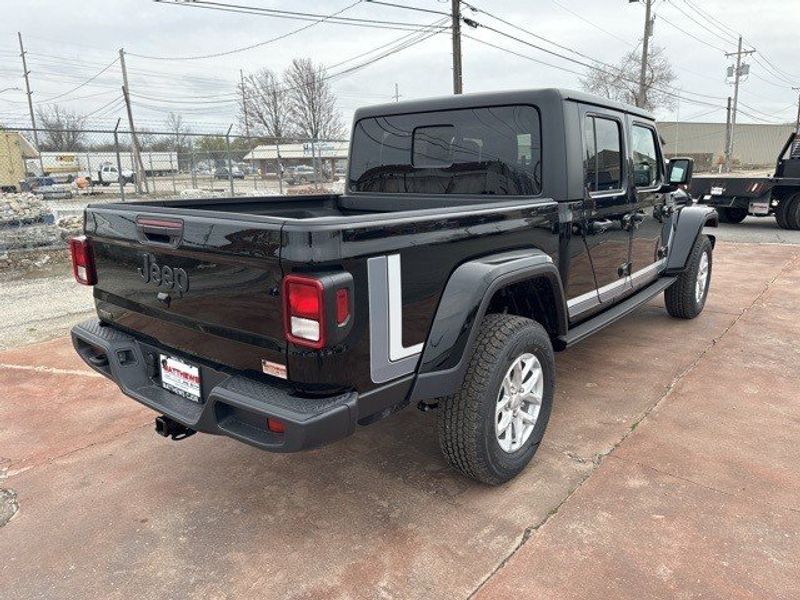 2023 Jeep Gladiator Sport S 4x4 in a Black Clear Coat exterior color and Blackinterior. Matthews Chrysler Dodge Jeep Ram 918-276-8729 cyclespecialties.com 