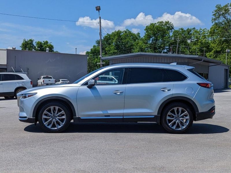 2021 Mazda CX-9 Grand Touring in a Sonic Silver Metallic exterior color. Johnson Dodge 601-693-6343 pixelmotiondemo.com 