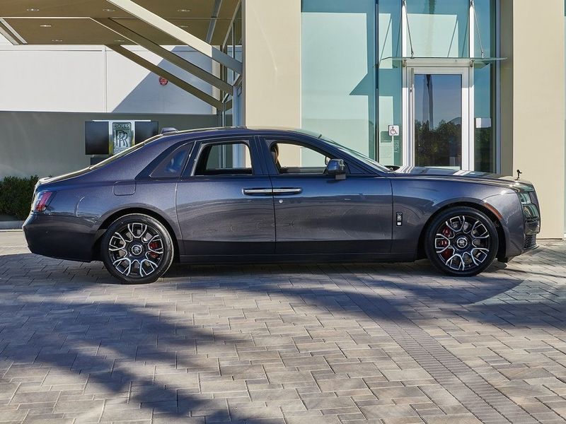 2024 Rolls-Royce Ghost  in a Gunmetal exterior color and Forge Yellowinterior. SHELLY AUTOMOTIVE shellyautomotive.com 