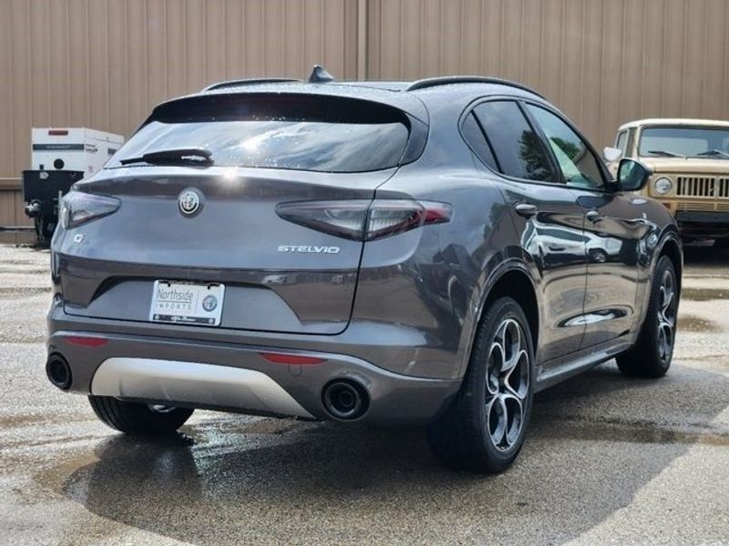 2024 Alfa Romeo Stelvio Ti Awd in a Vesuvio Gray Metallic exterior color and Blackinterior. Northside Alfa Romeo of Houston 281-475-4549 alfaromeousaofnorthhouston.com 