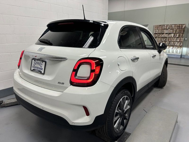 2023 Fiat 500x Pop Awd in a Bianco Gelato (White Clear Coat) exterior color and Blackinterior. Schmelz Countryside Alfa Romeo and Fiat (651) 968-0556 schmelzfiat.com 