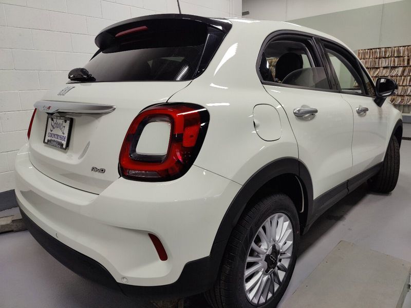 2023 Fiat 500x Pop Awd in a Bianco Gelato (White Clear Coat) exterior color and Black Heated Seatsinterior. Schmelz Countryside Alfa Romeo and Fiat (651) 968-0556 schmelzfiat.com 