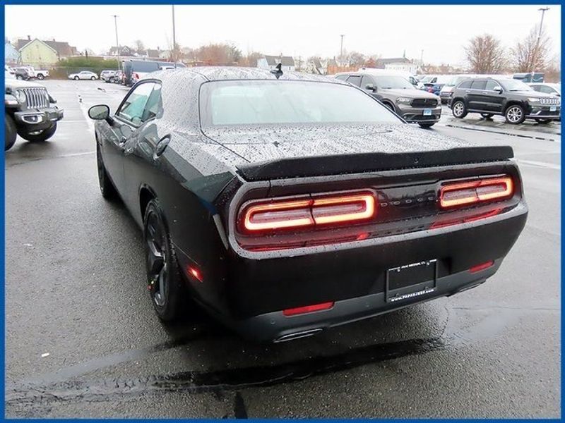 2023 Dodge Challenger R/T in a Pitch-Black exterior color and Blackinterior. Papas Jeep Ram In New Britain, CT 860-356-0523 papasjeepram.com 