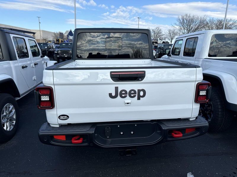 2024 Jeep Gladiator Rubicon 4x4 in a Bright White Clear Coat exterior color. Gupton Motors Inc 615-384-2886 guptonmotors.com 