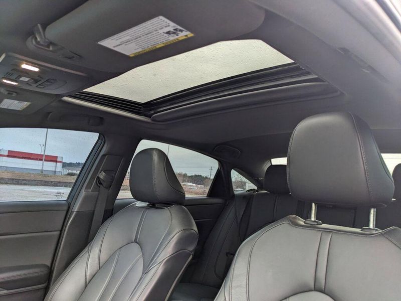 2022 Toyota Avalon Hybrid XLE in a Ice Edge exterior color and Blackinterior. Johnson Dodge 601-693-6343 pixelmotiondemo.com 