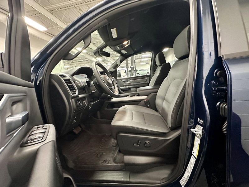 2023 RAM 1500 Big Horn Crew Cab 4x4 w/Heated Seats in a Patriot Blue Pearl Coat exterior color and Diesel Gray/Black Heated Seatsinterior. Schmelz Countryside Alfa Romeo and Fiat (651) 968-0556 schmelzfiat.com 
