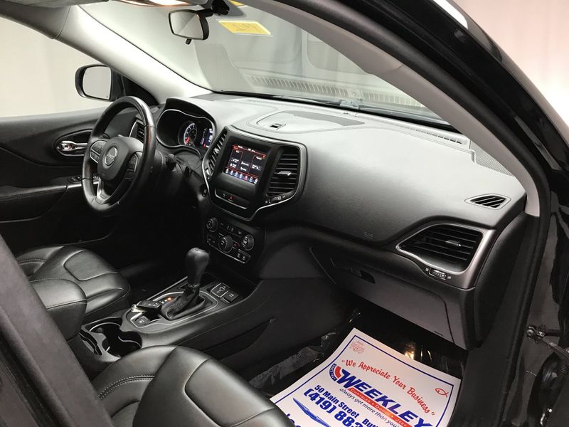 2019 Jeep Cherokee Latitude Plus in a Diamond Black Crystal Pearl Coat exterior color and Blackinterior. Weekley Chrysler Dodge Jeep Co 419-740-1451 weekleychryslerdodgejeep.com 