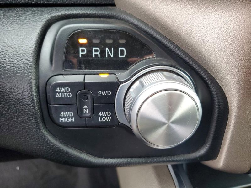 2020 RAM 1500 Laramie in a Bright White Clear Coat exterior color and Blackinterior. Johnson Dodge 601-693-6343 pixelmotiondemo.com 