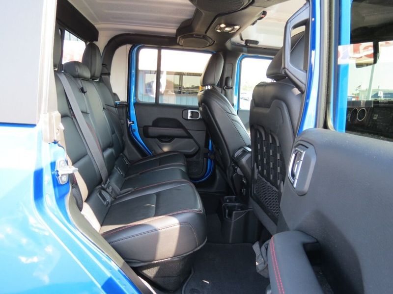 2021 Jeep Gladiator Rubicon 4x4 4dr Crew Cab 5.0 ft. SB in a Blue exterior color and Blackinterior. Militello Motors ​507-200-4344 militellomotors.net 