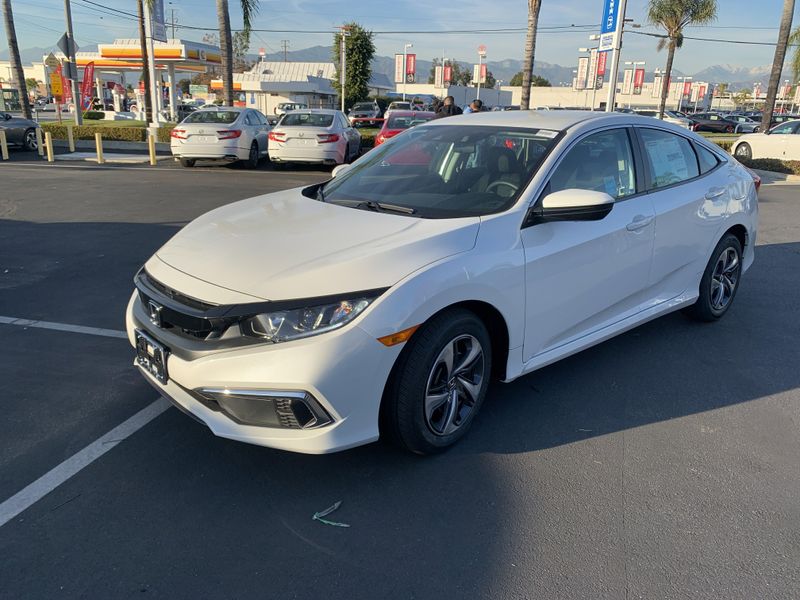 2020 Honda Civic Sedan LX in a White exterior color. BEACH BLVD OF CARS beachblvdofcars.com 