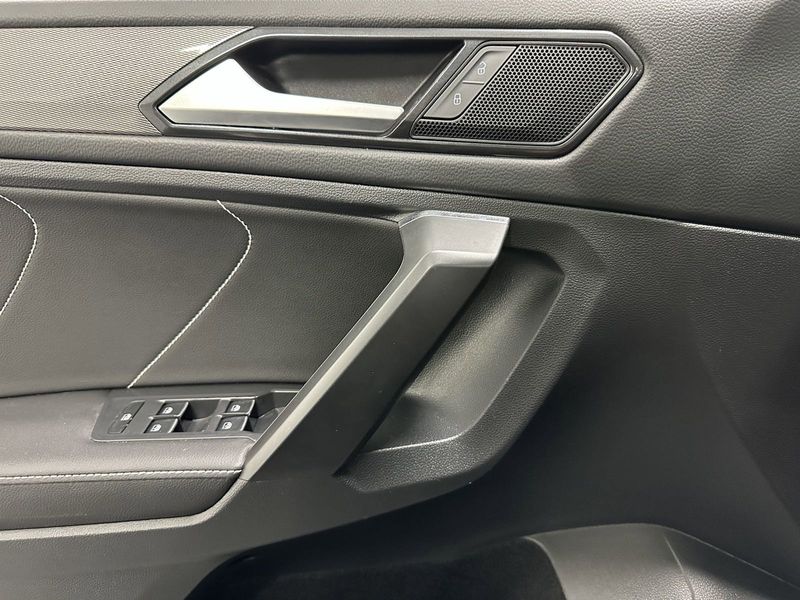 2023 Volkswagen Tiguan SE w/Sunroof & 3rd Row in a Pyrite Silver Metallic exterior color and Black Heated Seatsinterior. Schmelz Countryside SAAB (888) 558-1064 stpaulsaab.com 