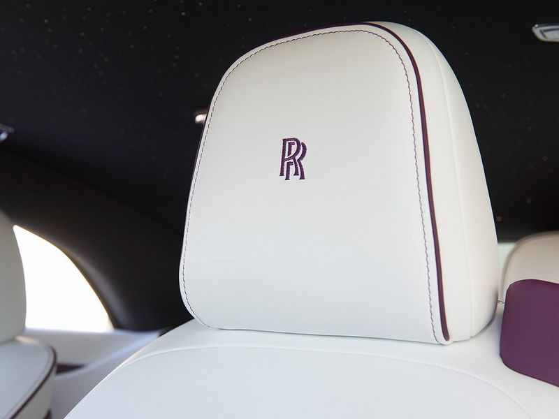 2024 Rolls-Royce Spectre  in a Twilight Purple exterior color and Arctic Whiteinterior. SHELLY AUTOMOTIVE shellyautomotive.com 