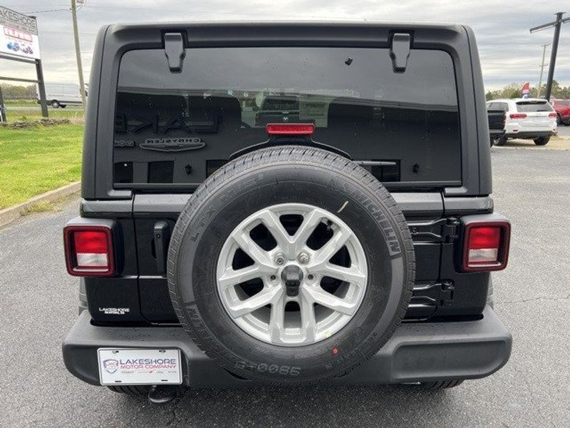 2023 Jeep Wrangler 2-door Sport S 4x4 in a Black Clear Coat exterior color and Blackinterior. Lakeshore CDJR Seaford 302-213-6058 lakeshorecdjr.com 