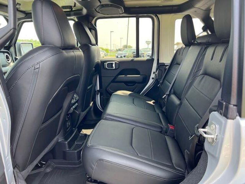 2023 Jeep Wrangler Sahara 4xe in a Silver Zynith Clear Coat exterior color and Blackinterior. Lakeshore CDJR Seaford 302-213-6058 lakeshorecdjr.com 