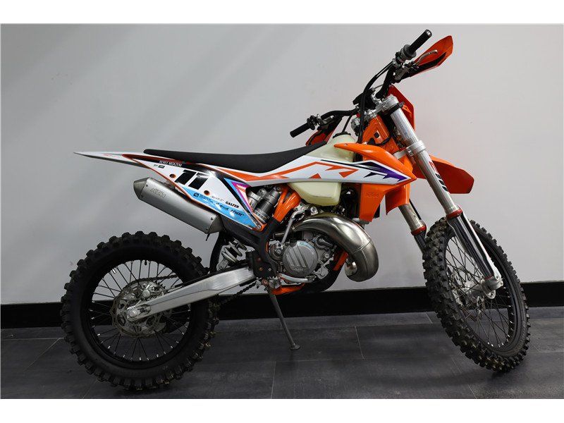 2023 KTM XC 150 W in a Orange exterior color. New England Powersports 978 338-8990 pixelmotiondemo.com 