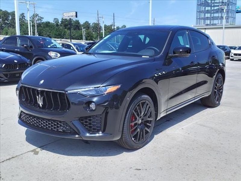 2024 Maserati Levante Modena in a Black exterior color and Black/Redinterior. Northside Imports Houston 281-475-4549 northsideimportshouston.com 