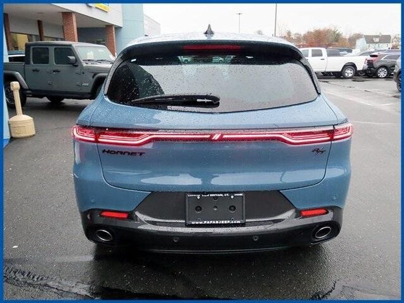 2024 Dodge Hornet R/T Plus in a Blue Steele exterior color and Blackinterior. Papas Jeep Ram In New Britain, CT 860-356-0523 papasjeepram.com 