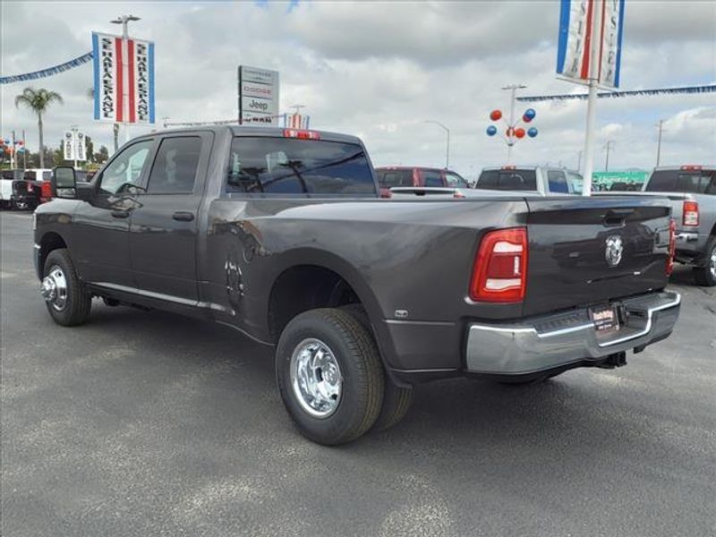 2024 RAM 3500 Tradesman in a Granite Crystal Metallic Clear Coat exterior color and -X8interior. Perris Valley Auto Center 951-657-6100 perrisvalleyautocenter.com 