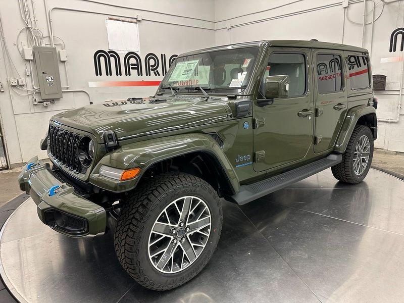 2024 Jeep Wrangler 4-door High Altitude 4xe in a Sarge Green Clear Coat exterior color and Green/Blackinterior. Marina Auto Group (855) 564-8688 marinaautogroup.com 