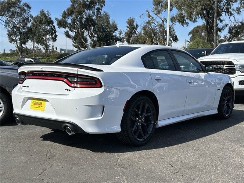 2023 Dodge Charger R/T in a White Knuckle exterior color and Blackinterior. McPeek