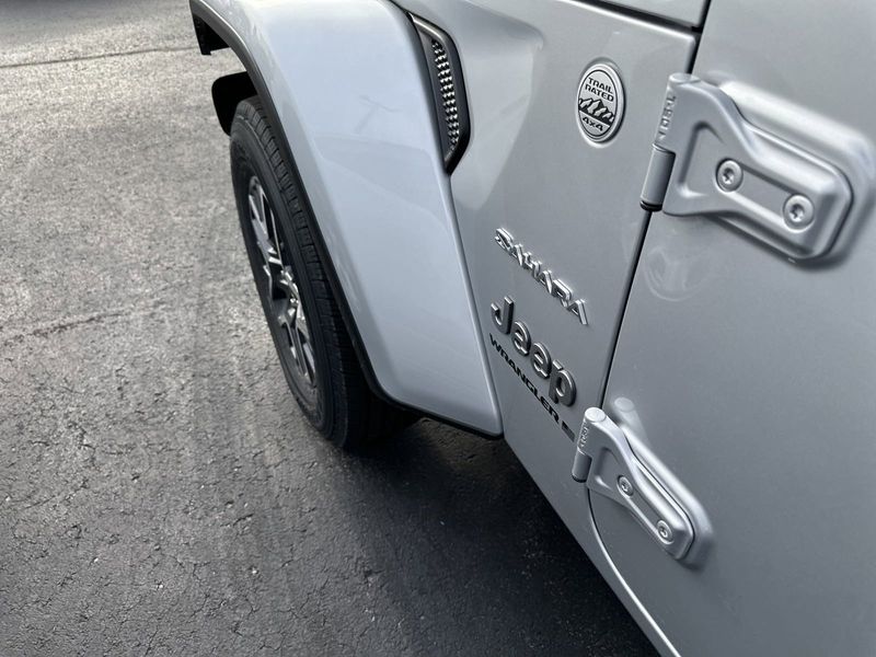 2024 Jeep Wrangler 4-door Sahara in a Silver Zynith Clear Coat exterior color and Blackinterior. Gupton Motors Inc 615-384-2886 guptonmotors.com 