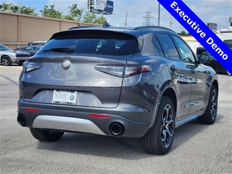 2024 Alfa Romeo Stelvio Ti Awd in a Vesuvio Gray Metallic exterior color and Chocolateinterior. Northside Alfa Romeo of Houston 281-475-4549 alfaromeousaofnorthhouston.com 