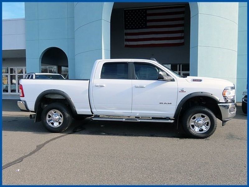 2019 RAM 2500 Big Horn in a Bright White Clear Coat exterior color and Blackinterior. Papas Jeep Ram In New Britain, CT 860-356-0523 papasjeepram.com 