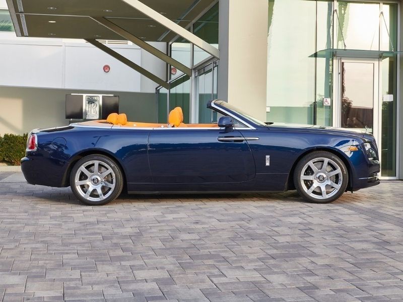 2019 Rolls-Royce Dawn  in a Midnight Sapphire exterior color and Mandarininterior. SHELLY AUTOMOTIVE shellyautomotive.com 