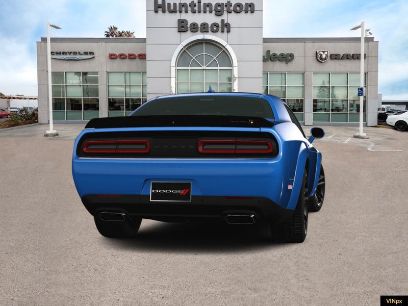 2023 Dodge Challenger R/T Scat Pack Widebody in a B5 Blue Pearl Coat exterior color and Blackinterior. BEACH BLVD OF CARS beachblvdofcars.com 