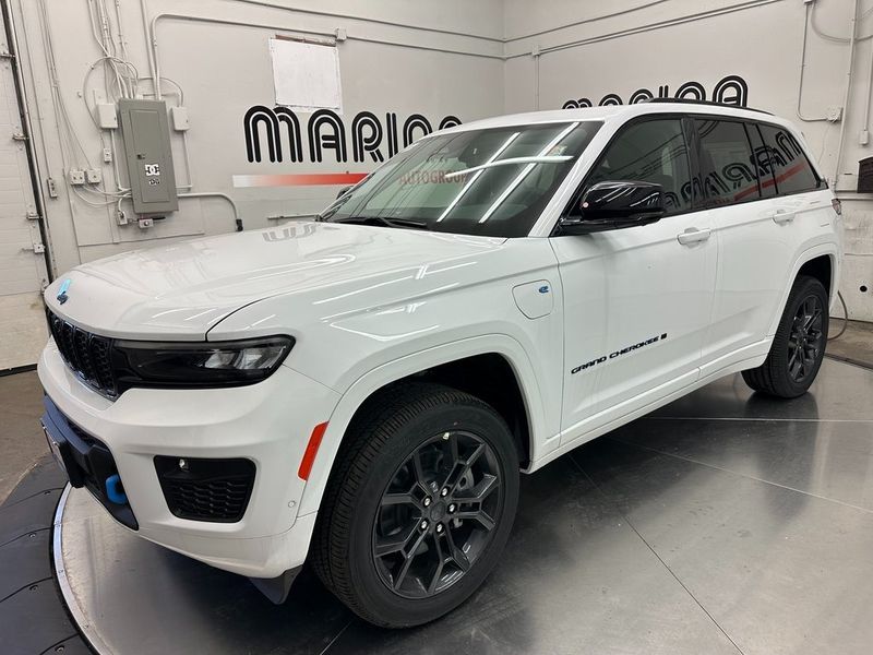 2024 Jeep Grand Cherokee Anniversary Edition 4xe in a Bright White Clear Coat exterior color and Global Blackinterior. Marina Auto Group (855) 564-8688 marinaautogroup.com 