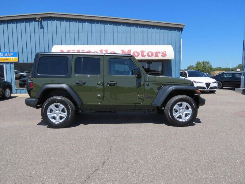 2022 Jeep Wrangler Unlimited Sport S 4x4 in a Sarge Green Clear Coat exterior color and Blackinterior. Militello Motors ​507-200-4344 militellomotors.net 