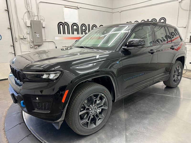 2024 Jeep Grand Cherokee Anniversary Edition 4xe in a Diamond Black Crystal Pearl Coat exterior color and Global Blackinterior. Marina Auto Group (855) 564-8688 marinaautogroup.com 