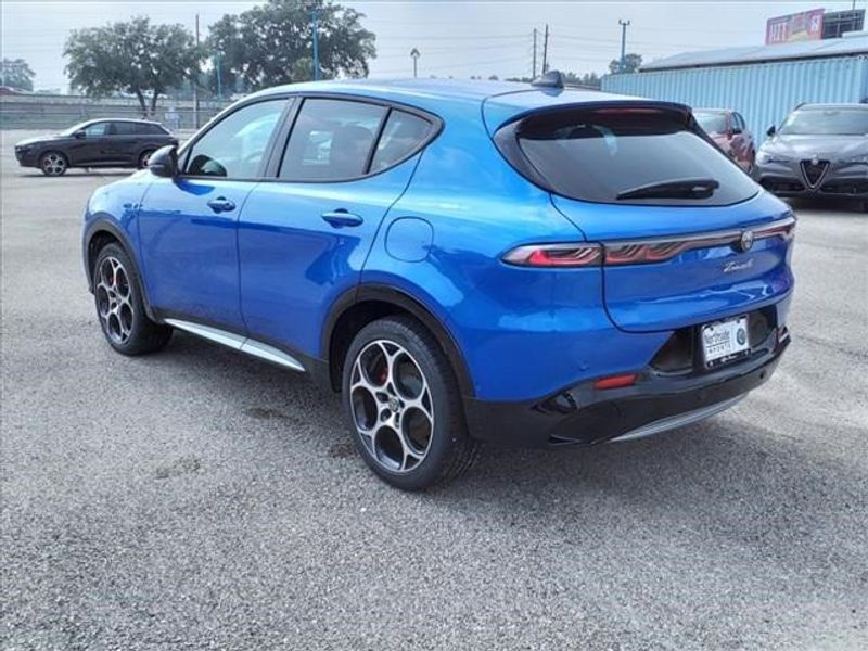 2024 Alfa Romeo Tonale Ti in a Misano Blue Metallic exterior color and Tan/Blackinterior. Northside Imports Houston 281-475-4549 northsideimportshouston.com 