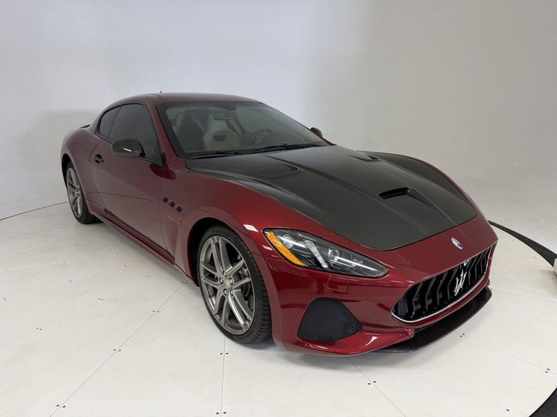 2018 Maserati GranTurismo MC in a Rosso Trionfale Metallic exterior color and Bianco Pregiatointerior. Karma Newport Beach (844) 527-6262 karmanb.com 