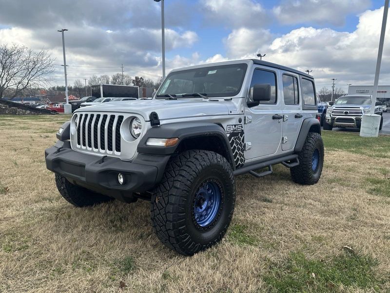 2024 Jeep Wrangler 4-door Sport S in a Silver Zynith Clear Coat exterior color and Blackinterior. Gupton Motors Inc 615-384-2886 guptonmotors.com 