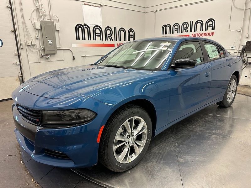 2023 Dodge Charger SXT Awd in a Frostbite exterior color and Blackinterior. Marina Chrysler Dodge Jeep RAM (855) 616-8084 marinadodgeny.com 